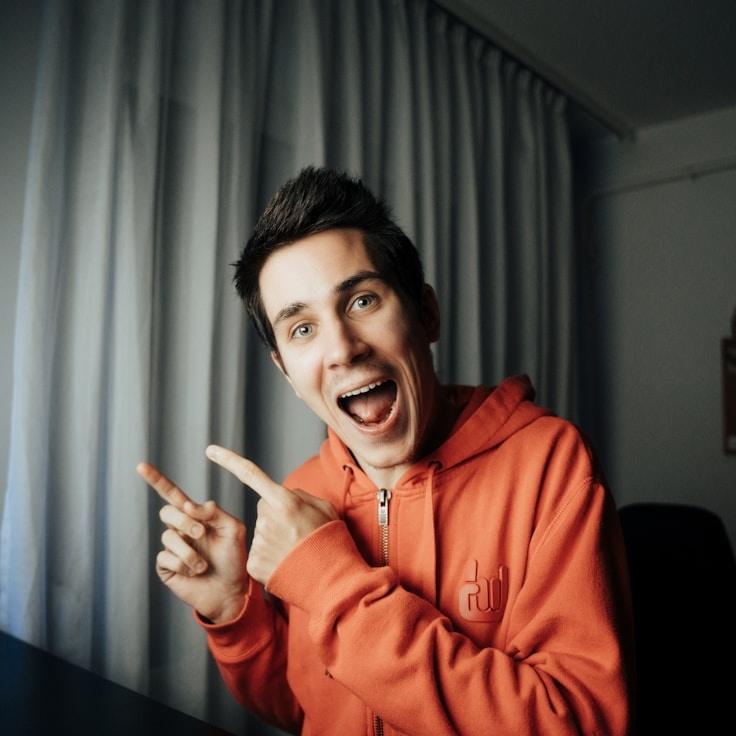 Kaveri Mehta, Lead Design Curator at Solar Sky Collect, reviewing corporate floral arrangements